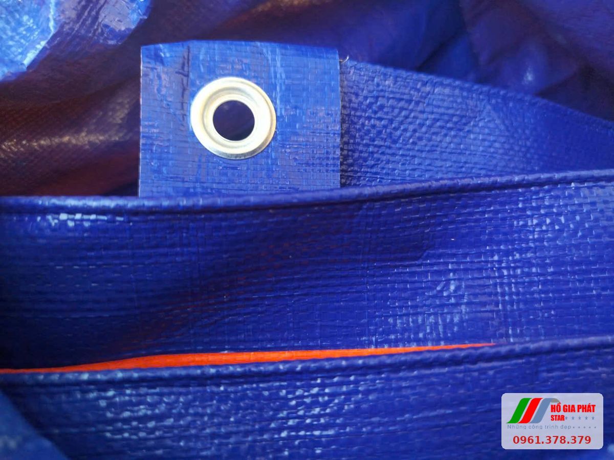 Mép bạt xanh cam đóng khoen, mặt xanh